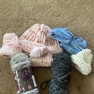 Home made baby hats and one adult hat 2 schemes of yarn